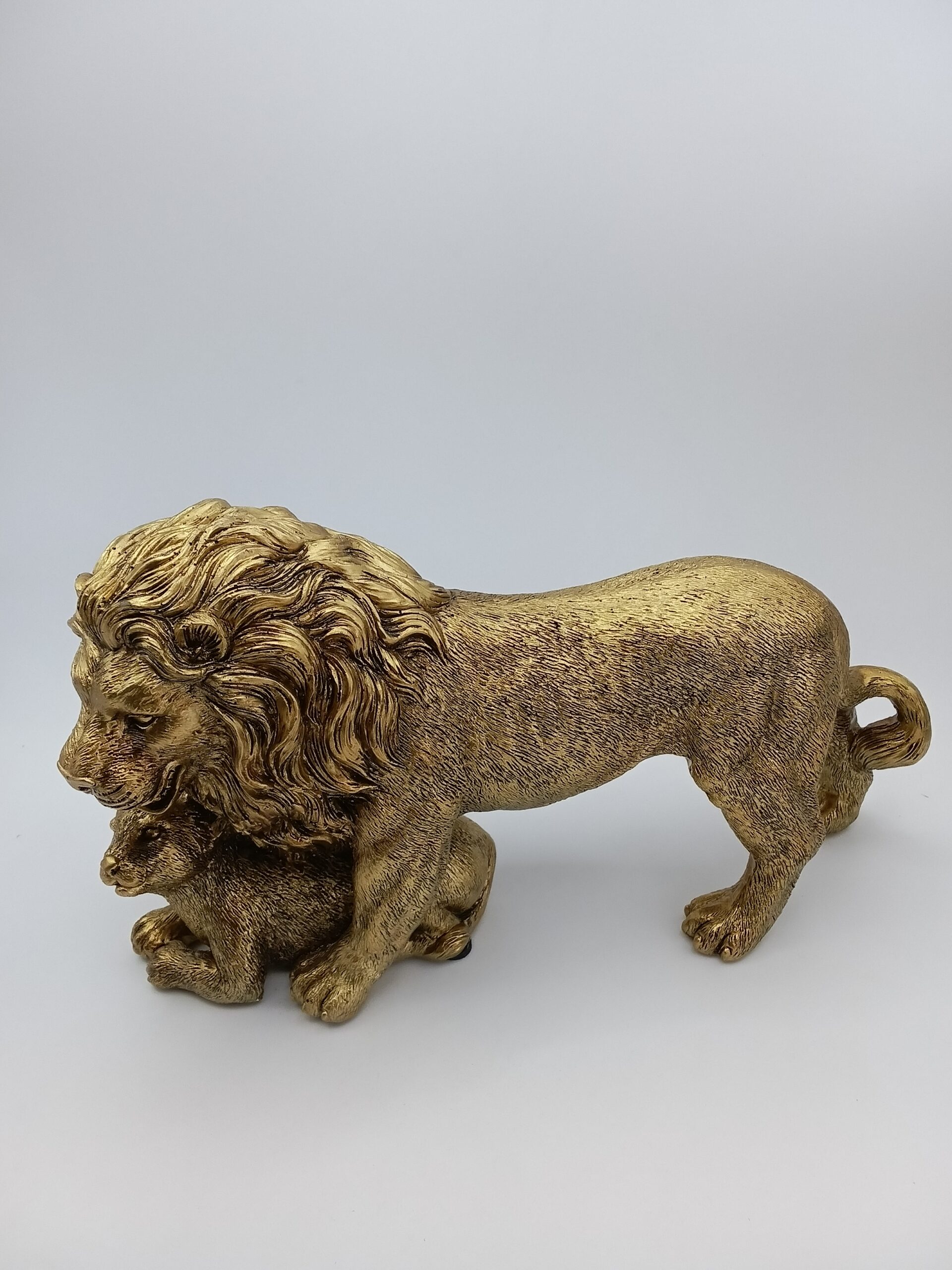Gold color lion with cub Gold color lion with cub