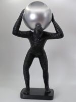 Man carrying ball on back