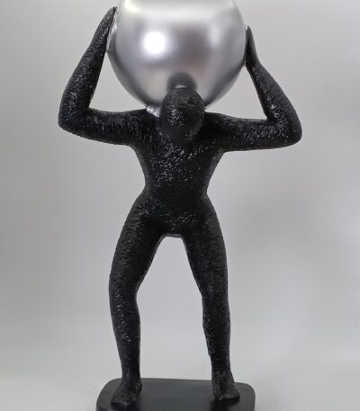 Man carrying ball on back